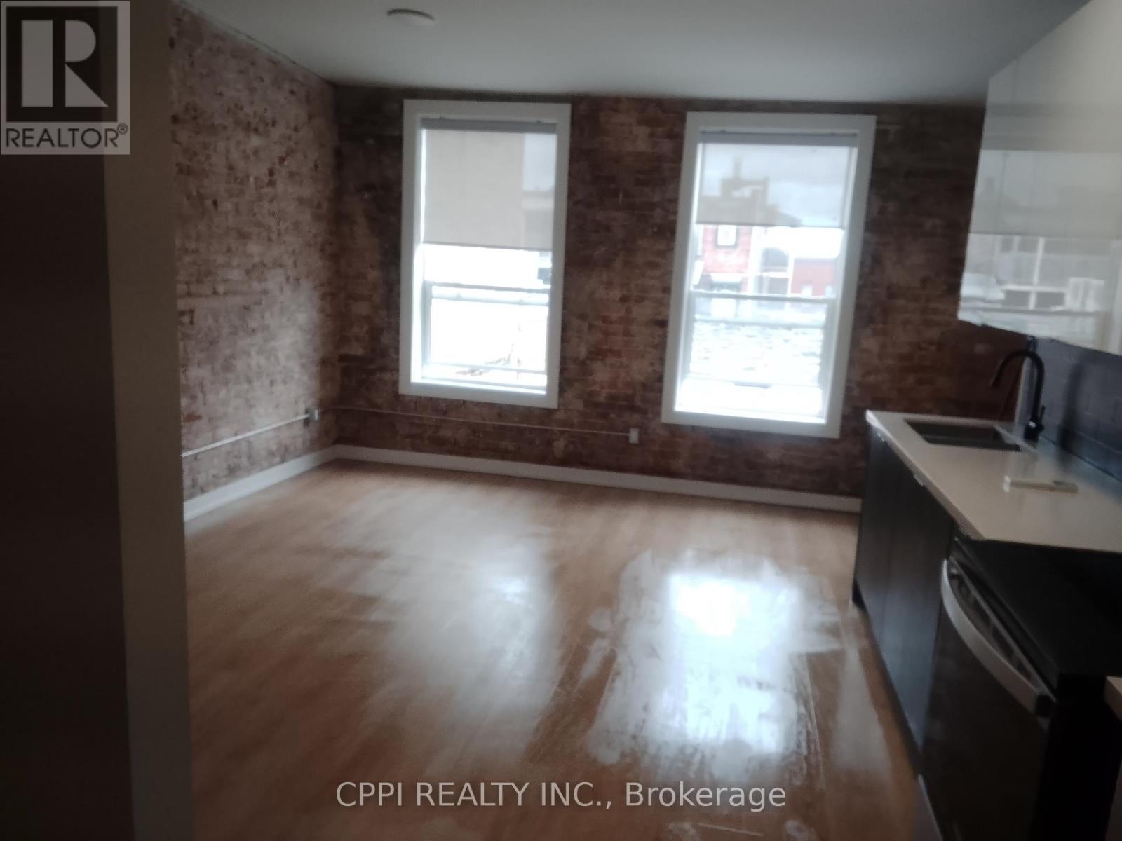 310 - 140 Simcoe Street, Peterborough, Ontario  K9H 0K5 - Photo 2 - X13117958