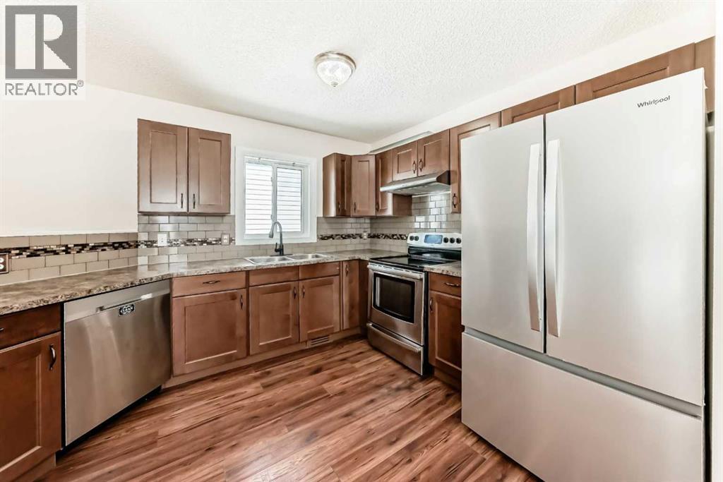 51 Covington Rise Ne, Calgary, Alberta  T3K 4A9 - Photo 7 - A2306446