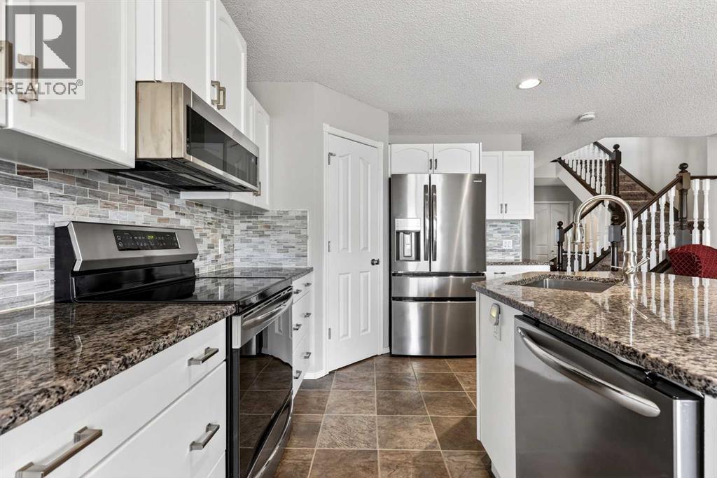 133 Cove Court, Chestermere, Alberta  T1X 1J4 - Photo 10 - A2309702