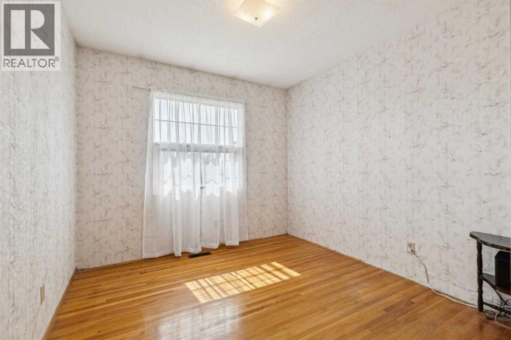 11427 Wilkes Road SE, Calgary, Alberta  T2J 2E5 - Photo 20 - A2286031