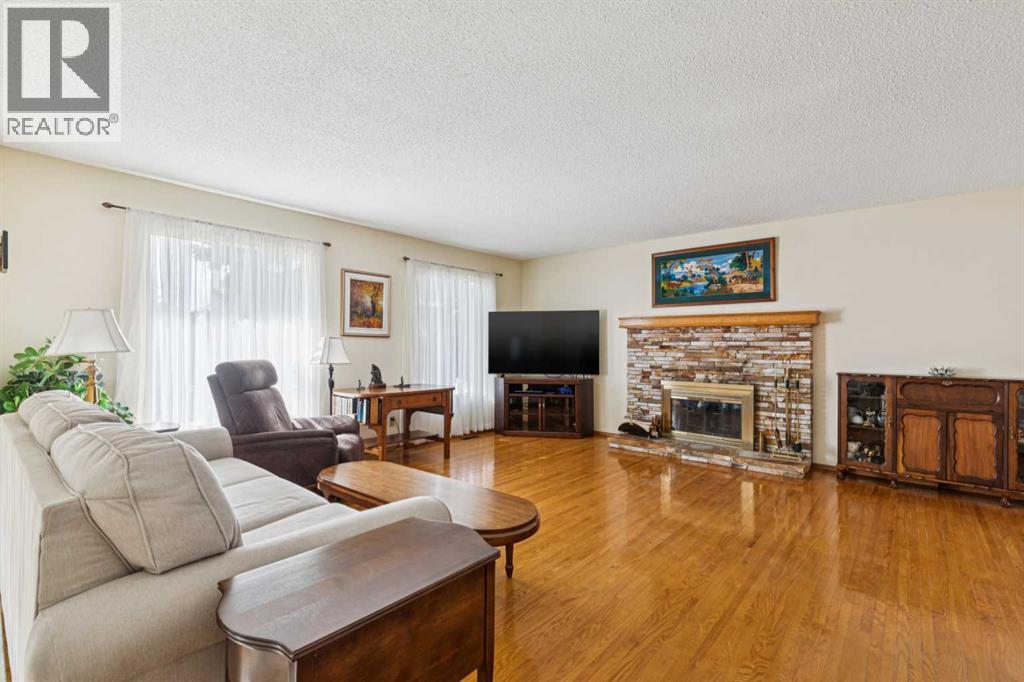 11427 Wilkes Road SE, Calgary, Alberta  T2J 2E5 - Photo 3 - A2286031