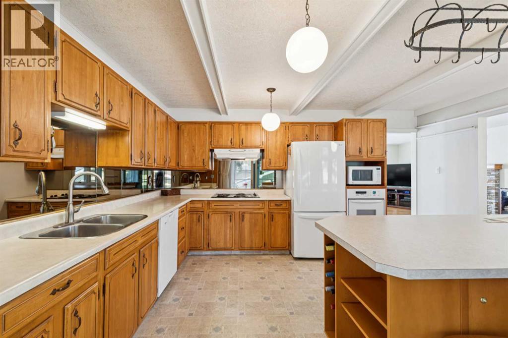 11427 Wilkes Road SE, Calgary, Alberta  T2J 2E5 - Photo 11 - A2286031