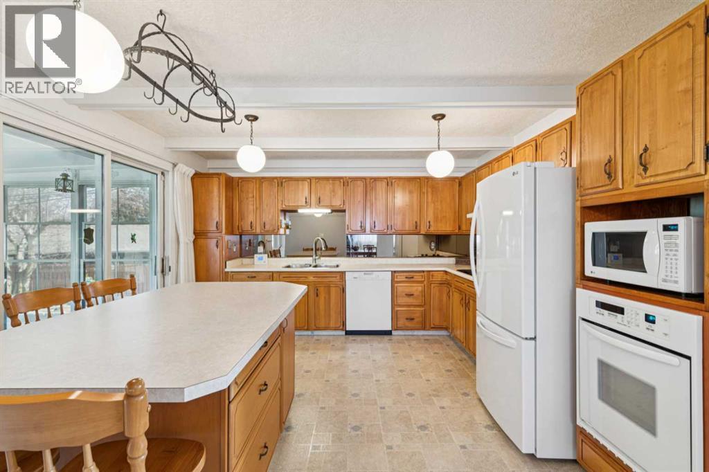 11427 Wilkes Road SE, Calgary, Alberta  T2J 2E5 - Photo 9 - A2286031