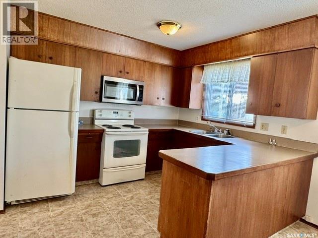 208 2nd Street Ne, Watson, Saskatchewan  S0K 4V0 - Photo 4 - SK035739