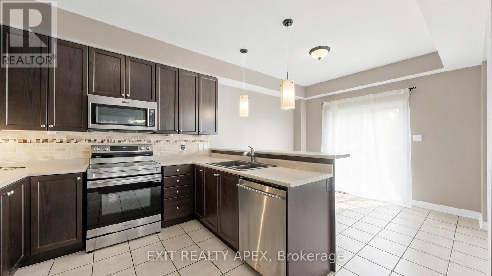 1311 Macinally Court, Oshawa, Ontario  L1K 0B6 - Photo 10 - E13090160