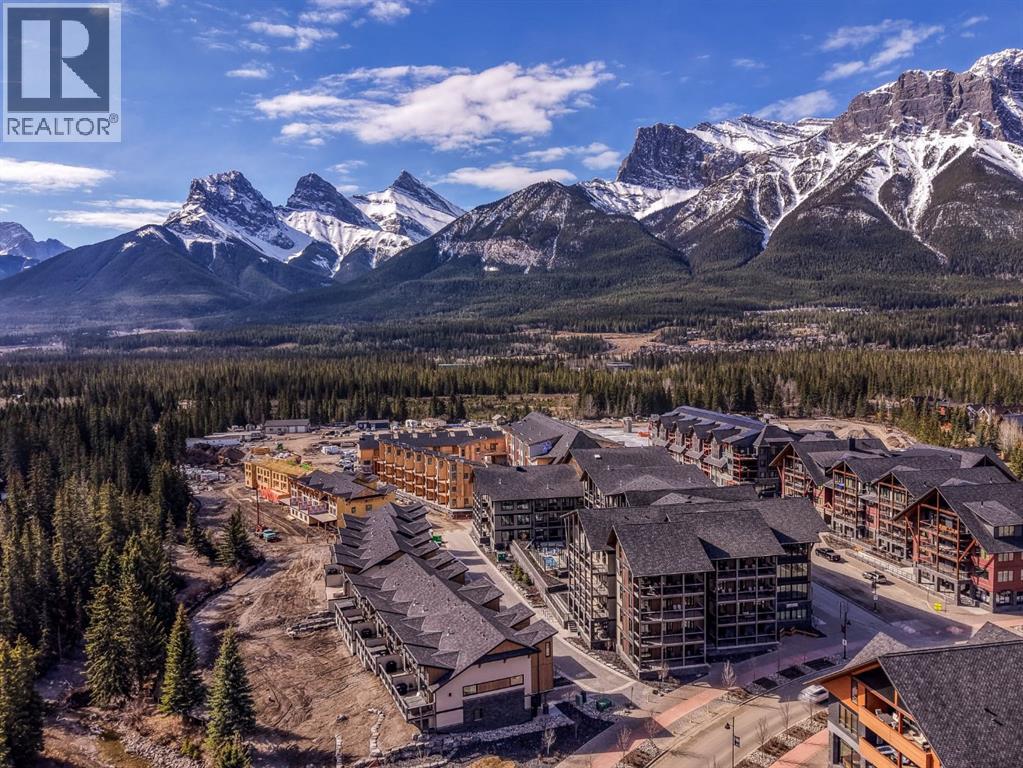 405, 1408 Spring Creek Gate, Canmore, Alberta  T1W 0N5 - Photo 1 - A2306007