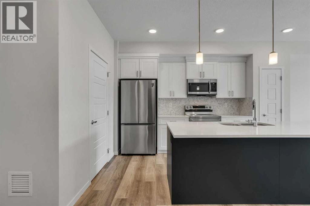 410, 200 Harvest Hills Place Ne, Calgary, Alberta  T3K 2N3 - Photo 6 - A2296524