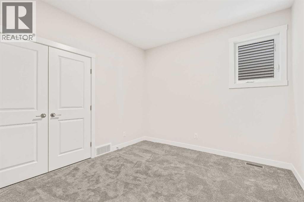 506 Lucas Way NW, Calgary, Alberta  T3P 2E7 - Photo 19 - A2307462