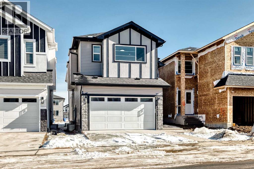 28 Saddlecrest Manor NE, Calgary, Alberta  T3J 2K3 - Photo 1 - A2310513