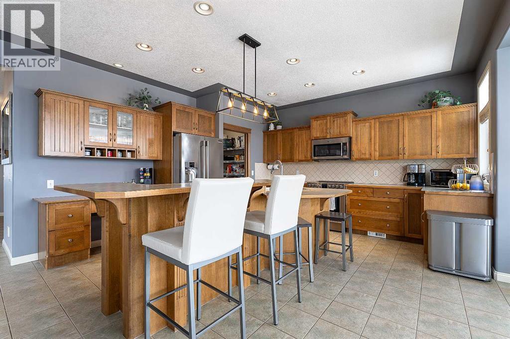 812 Coopers Drive SW, Airdrie, Alberta  T4B 2W3 - Photo 3 - A2305355