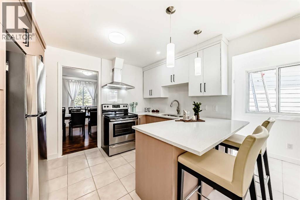 451 Huntbourne Hill Ne, Calgary, Alberta  T2K 5G7 - Photo 4 - A2307579