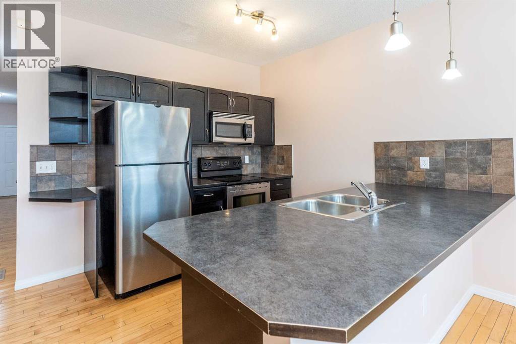 36 Everridge Gardens SW, Calgary, Alberta  T2Y 0H1 - Photo 6 - A2309371