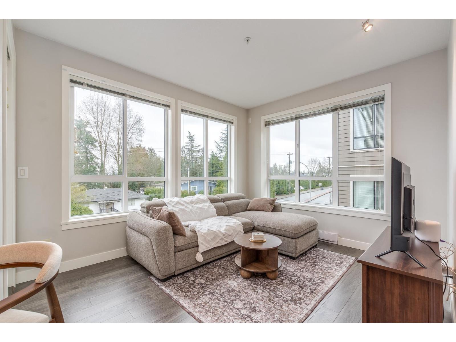 406 15388 105 Avenue, Surrey, British Columbia  V3R 0C4 - Photo 1 - R3122909