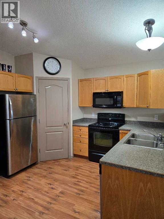 8821 65 Avenue, Grande Prairie, Alberta  T8W 2X5 - Photo 5 - A2308393