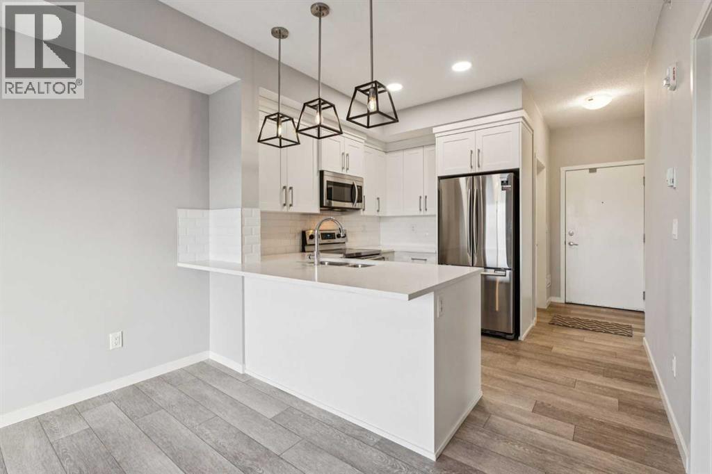 407, 370 Harvest Hills Common Ne, Calgary, Alberta  T3K 2M8 - Photo 11 - A2304994