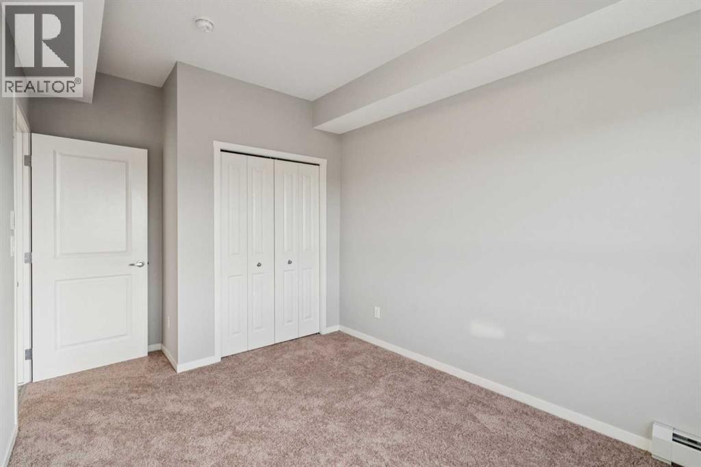 407, 370 Harvest Hills Common Ne, Calgary, Alberta  T3K 2M8 - Photo 19 - A2304994