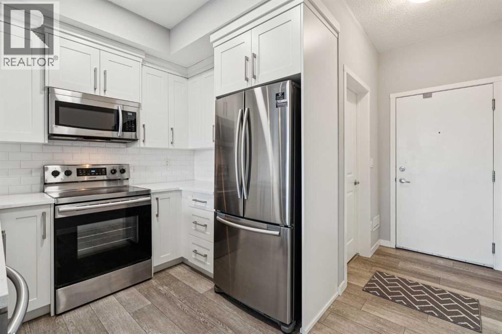 407, 370 Harvest Hills Common Ne, Calgary, Alberta  T3K 2M8 - Photo 6 - A2304994