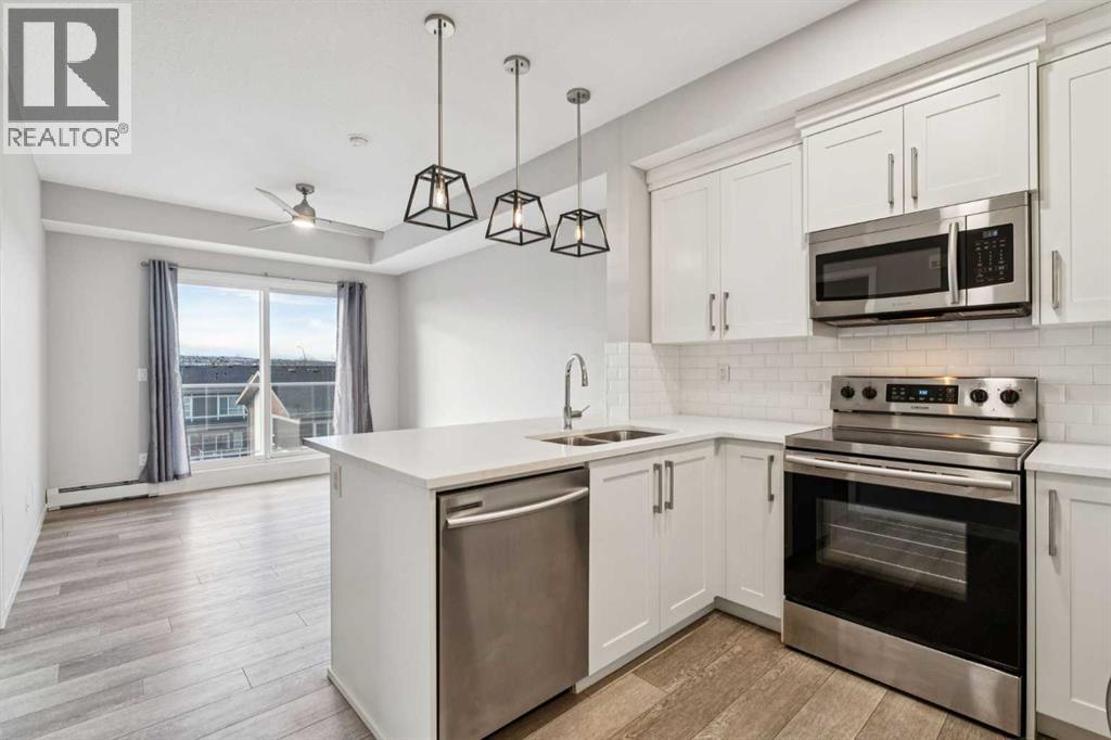 407, 370 Harvest Hills Common Ne, Calgary, Alberta  T3K 2M8 - Photo 7 - A2304994