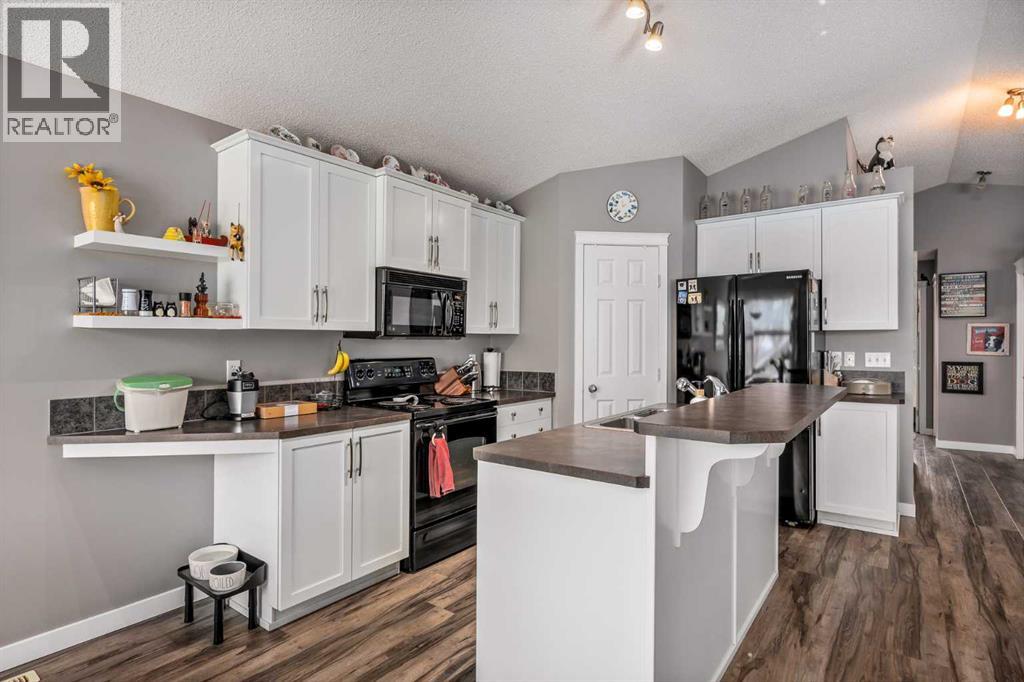 2367 Sagewood Gate Sw, Airdrie, Alberta  T4B 3M7 - Photo 6 - A2310565