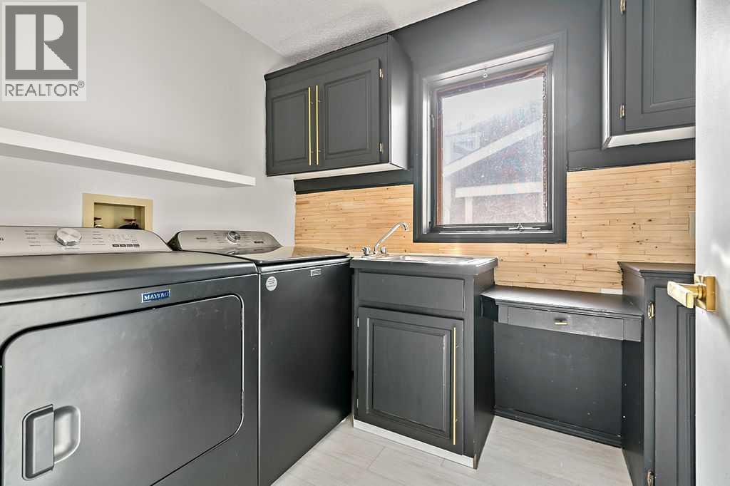 162 Woodbend Way, Okotoks, Alberta  T1S 1M1 - Photo 38 - A2287796