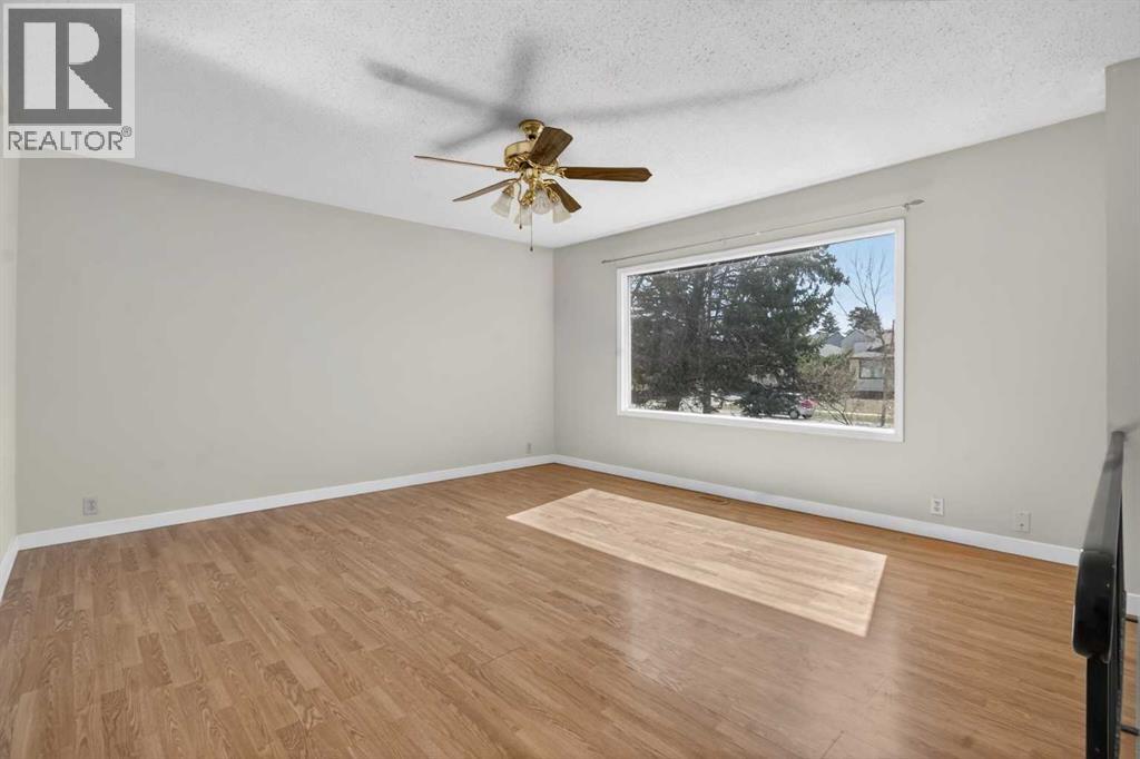 900 Abbeydale Drive Ne, Calgary, Alberta  T2A 5Y1 - Photo 3 - A2307433