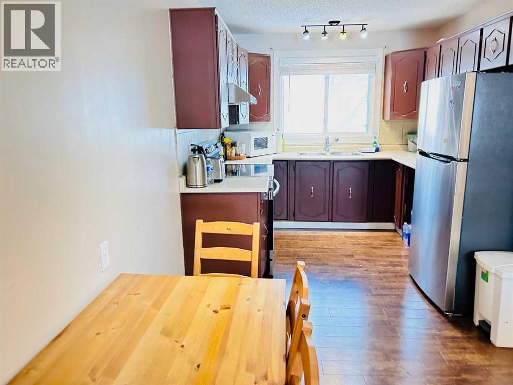 223 Pineland Place Ne, Calgary, Alberta  T1Y 3L4 - Photo 6 - A2299828