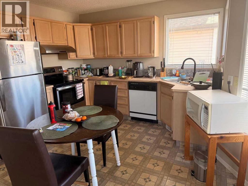7212 Sierra Morena Boulevard SW, Calgary, Alberta  T3H 3G5 - Photo 7 - A2308935