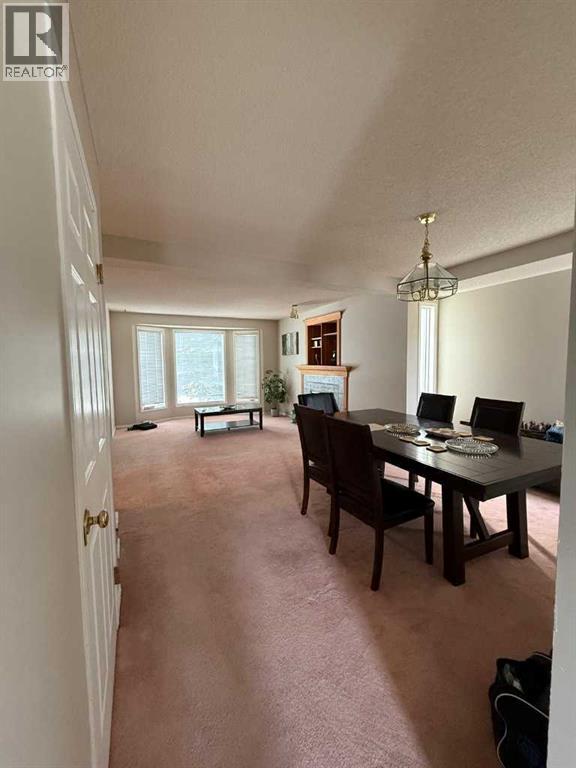 7212 Sierra Morena Boulevard SW, Calgary, Alberta  T3H 3G5 - Photo 4 - A2308935