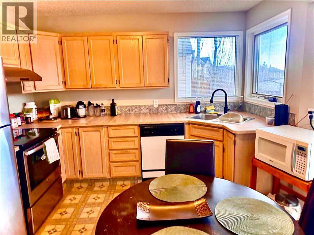 7212 Sierra Morena Boulevard SW, Calgary, Alberta  T3H 3G5 - Photo 8 - A2308935