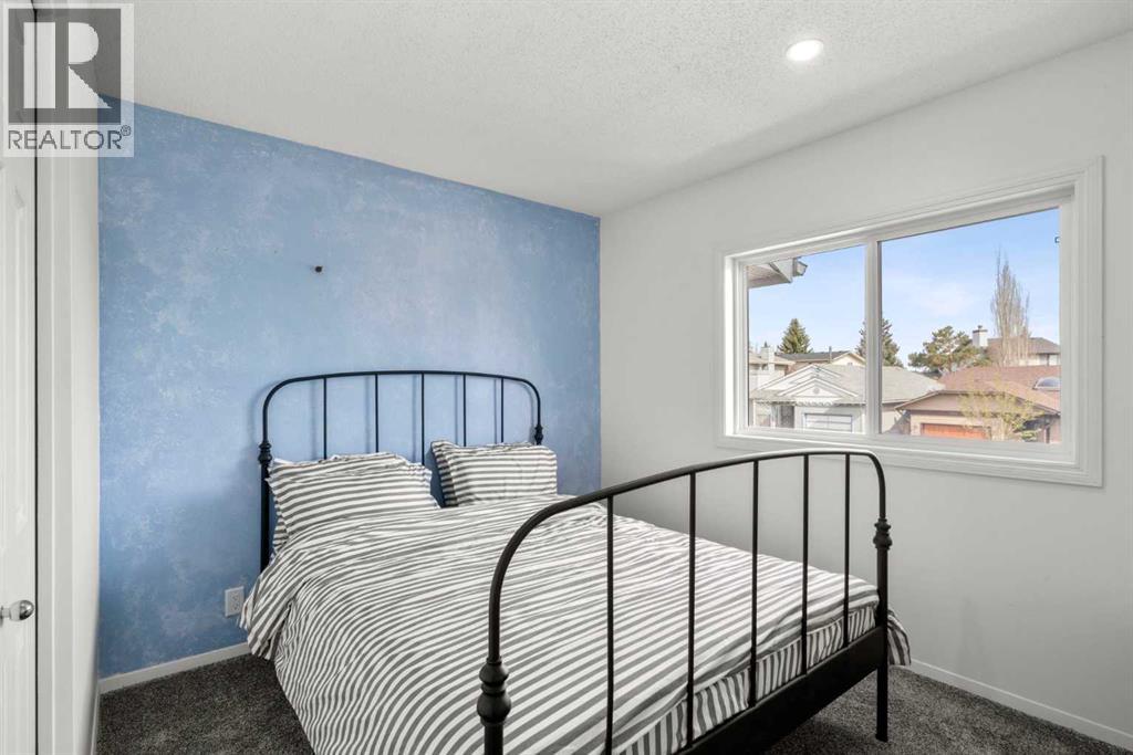 107 Cedargrove Way Sw, Calgary, Alberta  T2W 4V1 - Photo 31 - A2306019