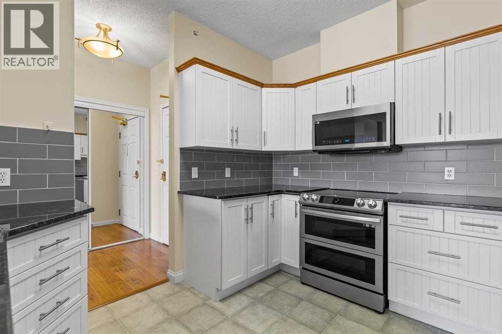 411, 5201 Dalhousie Drive NW, Calgary, Alberta  T3A 5Y7 - Photo 9 - A2309808