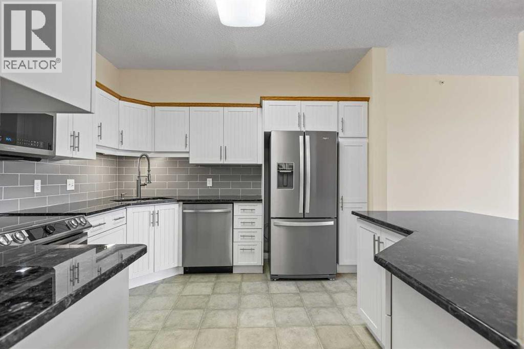 411, 5201 Dalhousie Drive NW, Calgary, Alberta  T3A 5Y7 - Photo 8 - A2309808