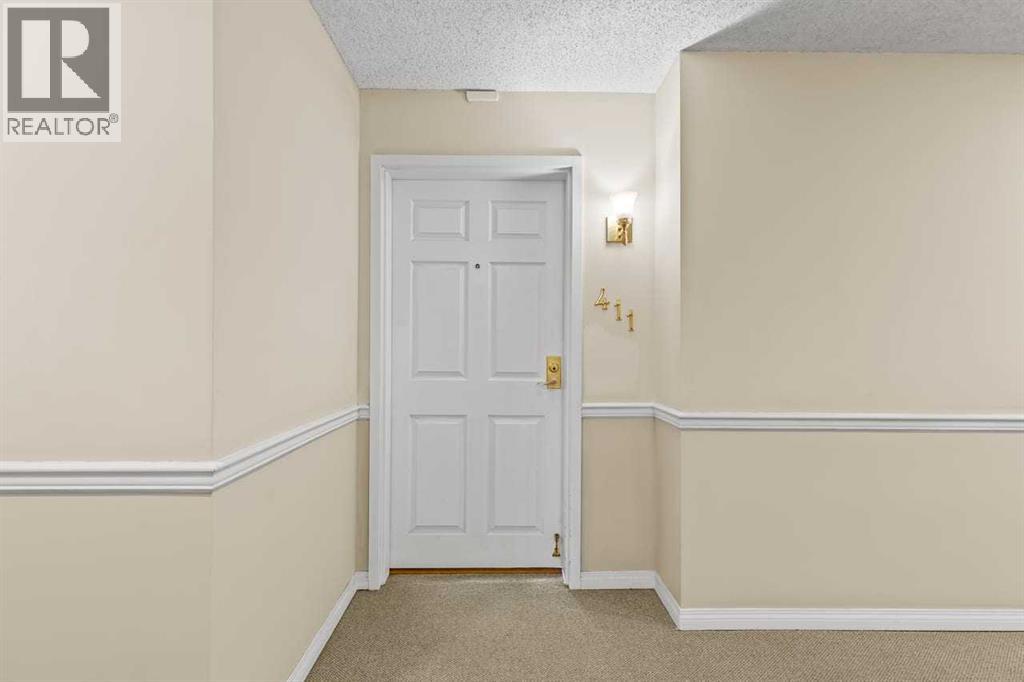 411, 5201 Dalhousie Drive NW, Calgary, Alberta  T3A 5Y7 - Photo 3 - A2309808