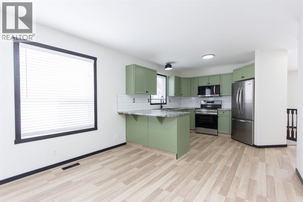 16 Johnson Close, Penhold, Alberta  T0M 0R1 - Photo 10 - A2310651