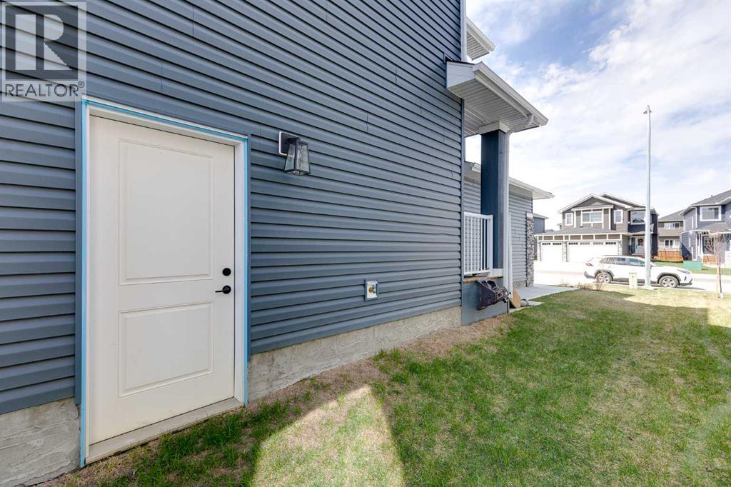 1436 Scarlett Ranch Boulevard, Carstairs, Alberta  T0M 0N0 - Photo 39 - A2309458