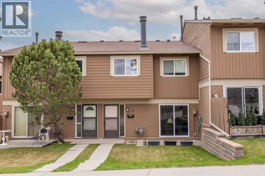 8, 4940 39 Avenue Sw, Calgary, Alberta  T3E 6M7 - Photo 1 - A2310774