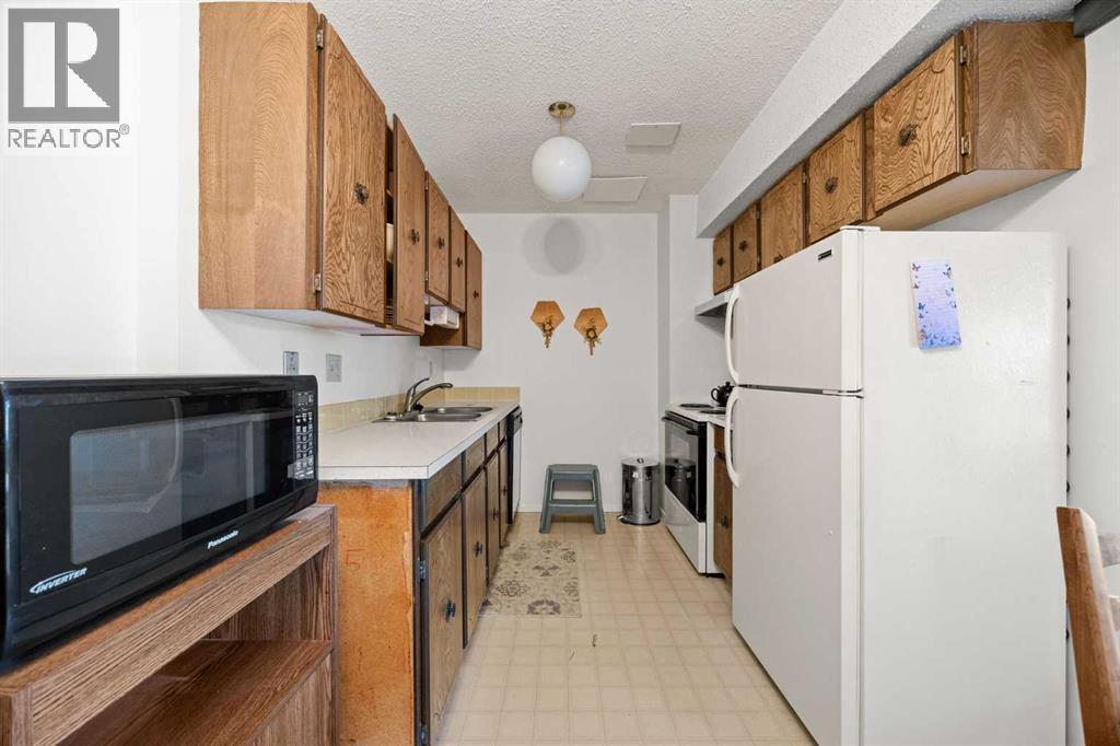 8, 4940 39 Avenue Sw, Calgary, Alberta  T3E 6M7 - Photo 9 - A2310774