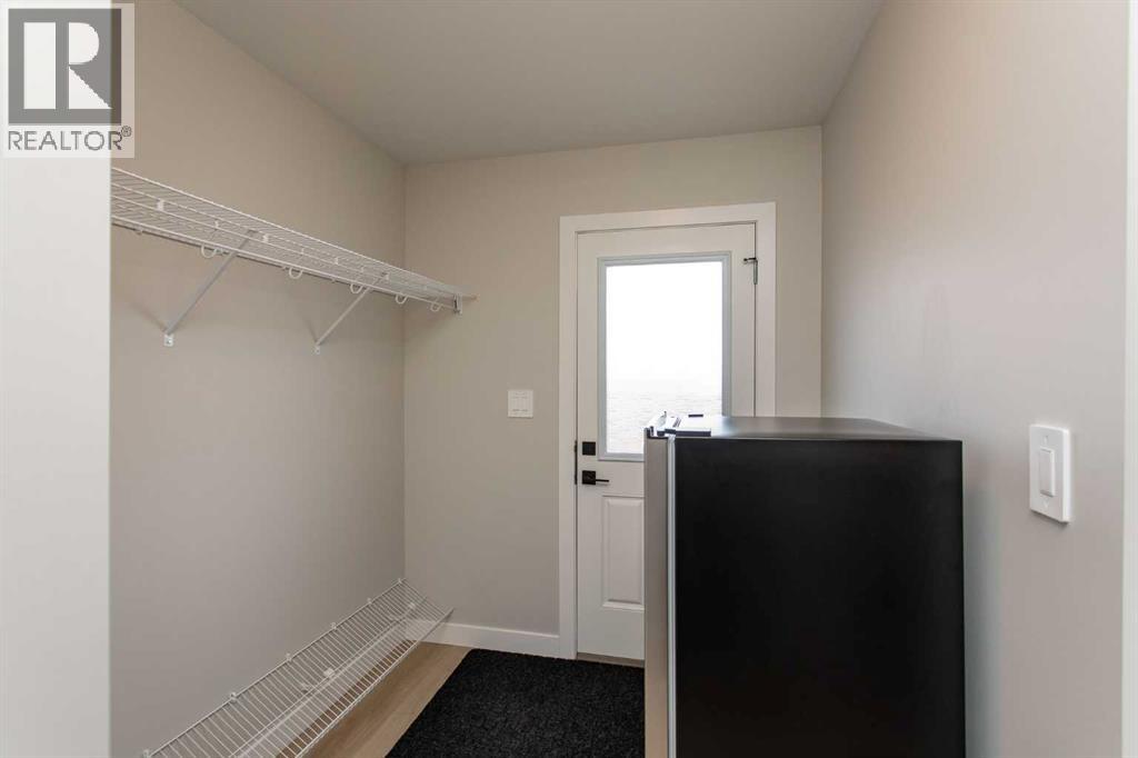 212 Halifax Close, Penhold, Alberta  T0M 1R0 - Photo 15 - A2309276