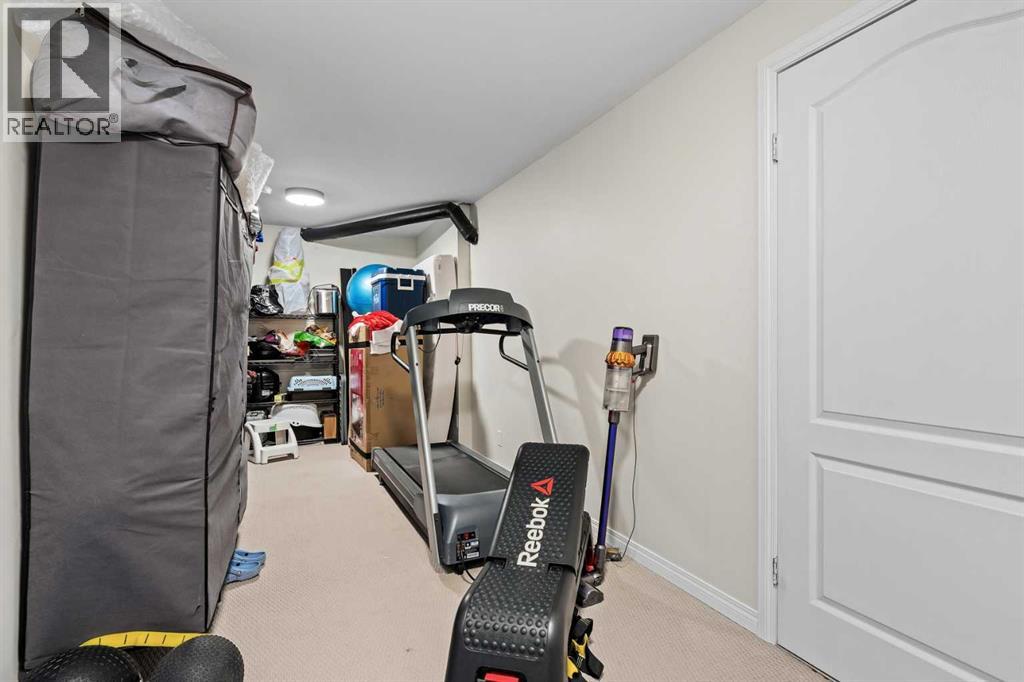 212 Coachway Lane SW, Calgary, Alberta  T3H 2V9 - Photo 30 - A2293656