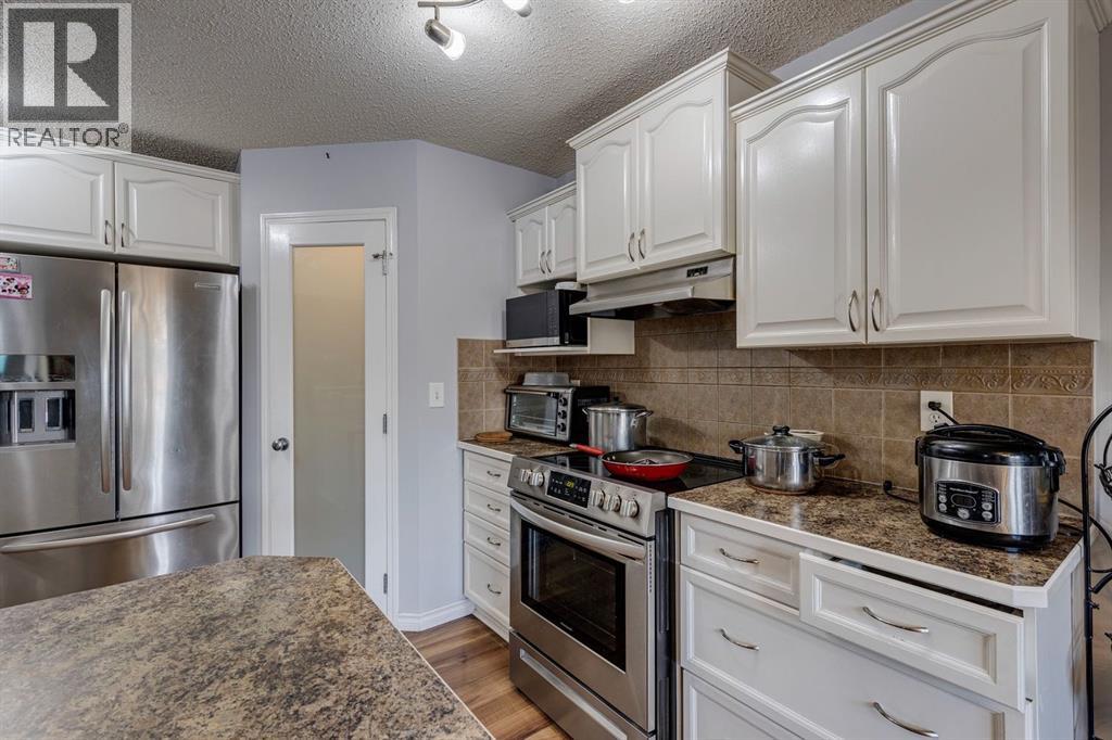 47 Westmount Road, Okotoks, Alberta T1S 2J3 - Photo 8 - A2310716