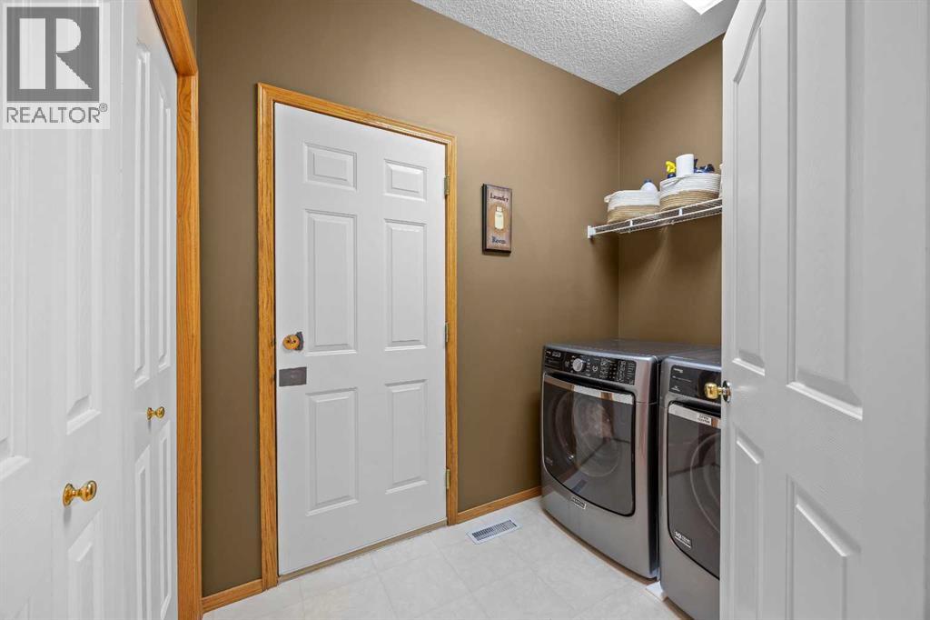 30 Gleneagles View, Cochrane, Alberta  T0L 0W2 - Photo 19 - A2308711