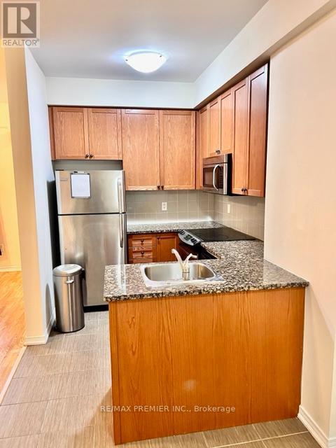 57 - 23 Coneflower Crescent, Toronto, Ontario  M2R 0A5 - Photo 3 - C13123122