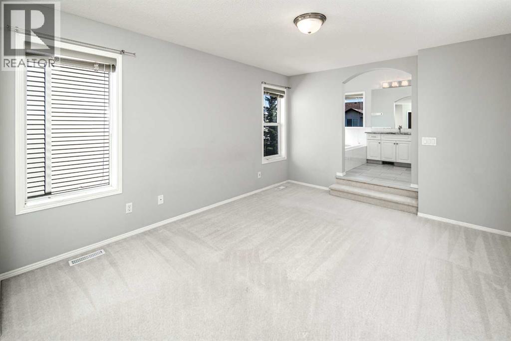 32 Cougarstone Square Sw, Calgary, Alberta  T3H 5J4 - Photo 28 - A2301938