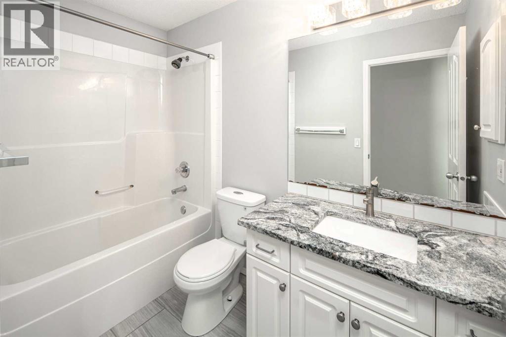 32 Cougarstone Square Sw, Calgary, Alberta  T3H 5J4 - Photo 27 - A2301938