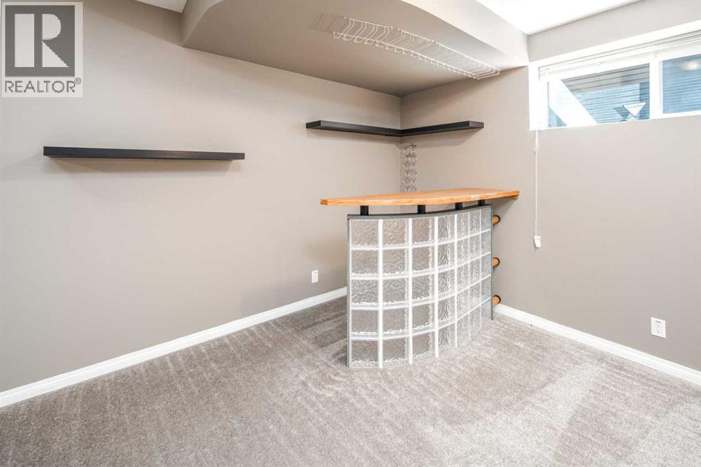 32 Cougarstone Square Sw, Calgary, Alberta  T3H 5J4 - Photo 30 - A2301938