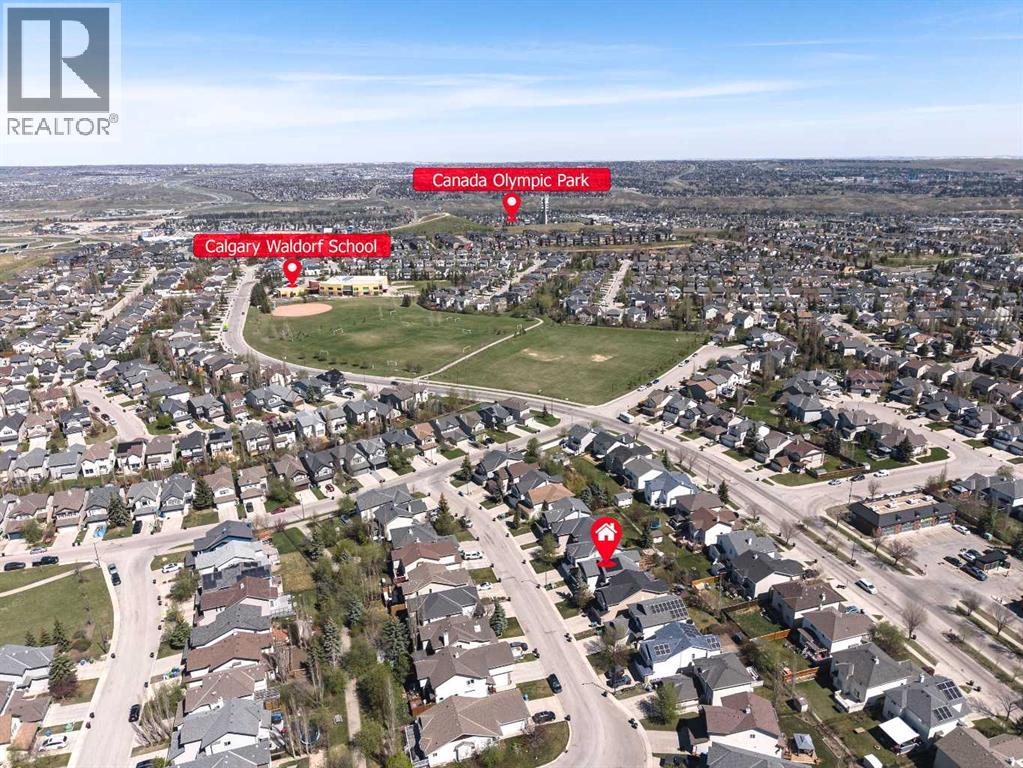 32 Cougarstone Square Sw, Calgary, Alberta  T3H 5J4 - Photo 3 - A2301938