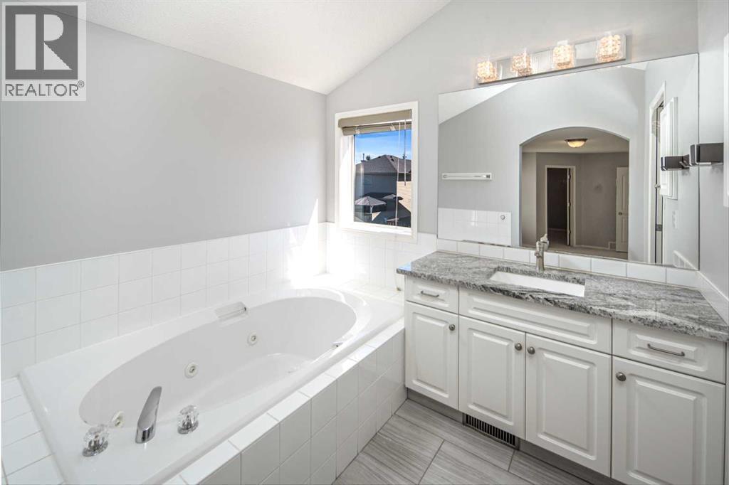 32 Cougarstone Square Sw, Calgary, Alberta  T3H 5J4 - Photo 25 - A2301938