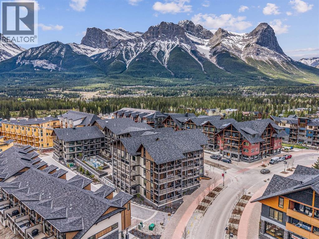 405, 1408 Spring Creek Gate, Canmore, Alberta  T1W 0N5 - Photo 1 - A2306007