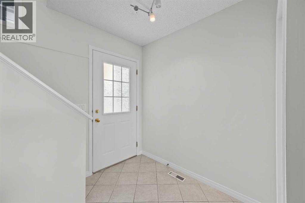 289 Hidden Spring Green Nw, Calgary, Alberta  T3A 5N2 - Photo 2 - A2308708