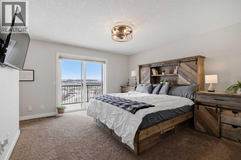 48 Heritage Green, Cochrane, Alberta  T4C 0L3 - Photo 18 - A2291764